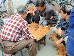 A sidewalk game of - Chinese checkers?